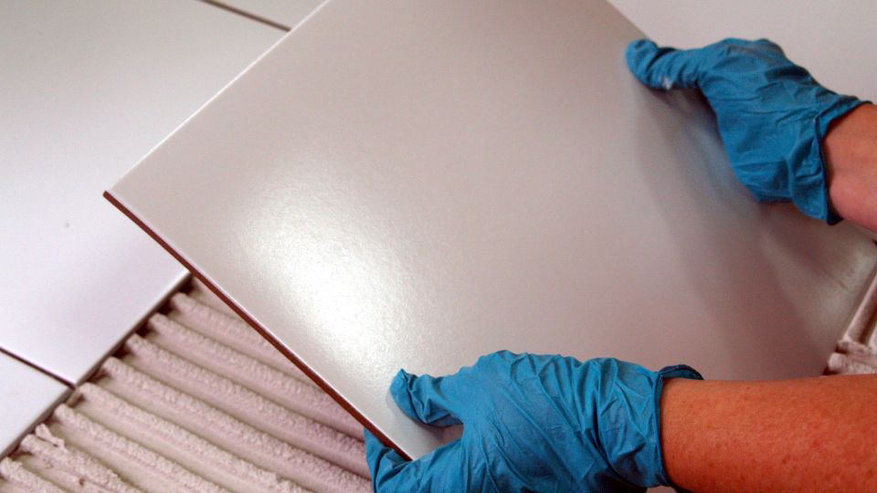 How to stop water leaking through bathroom and shower tiles